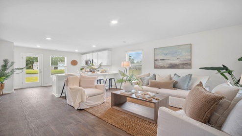 Living room to kitchen view Curtis model