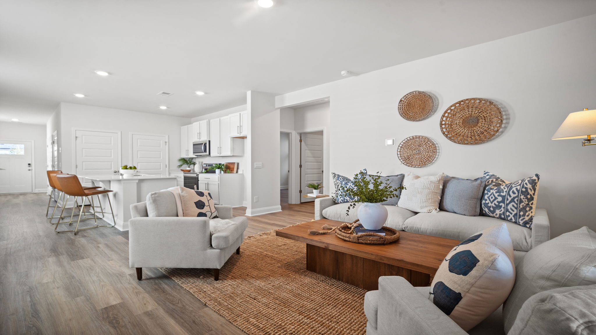 Living room with a couch, chairs and a table