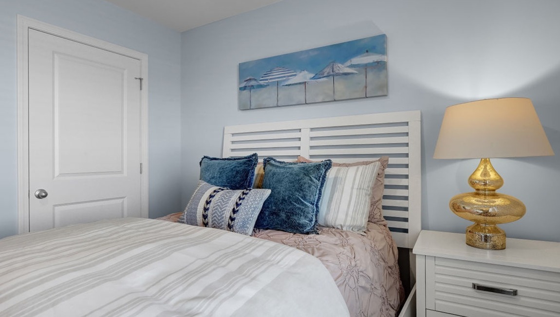 "Bright guest bedroom in the Macon home designed for family, visitors, or a flexible home office space."