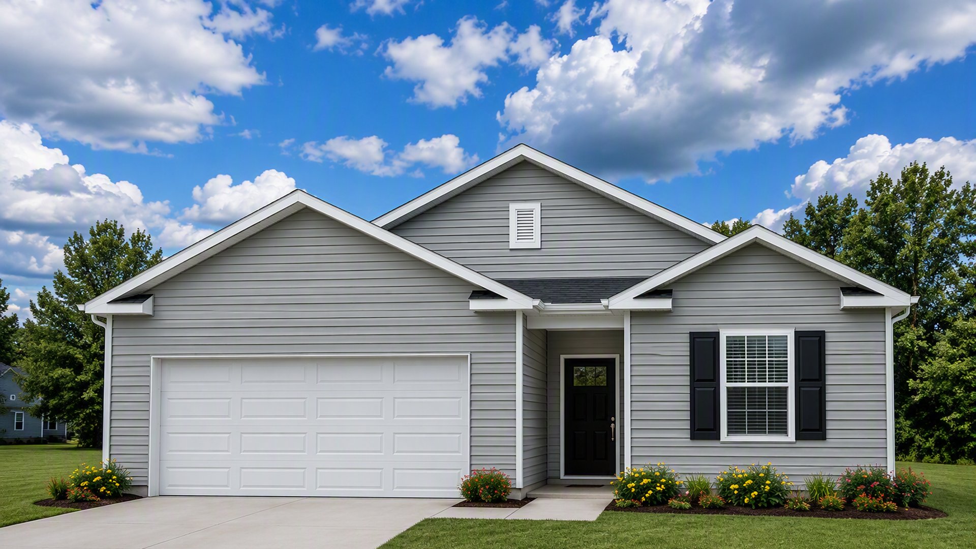 New construction Macon home with stylish exterior finishes, landscaped yard, and inviting front porch.