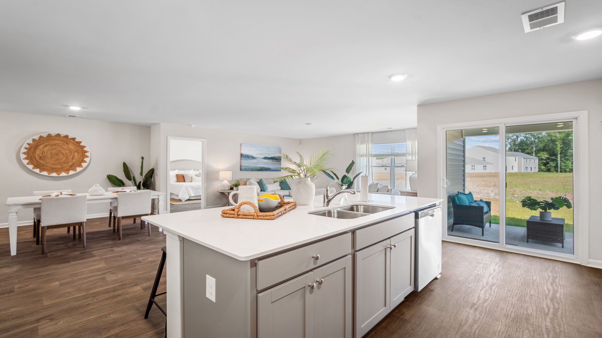 Open-concept Kerry kitchen designed for everyday living with sleek finishes, abundant counter space, and seamless flow to the dining area.