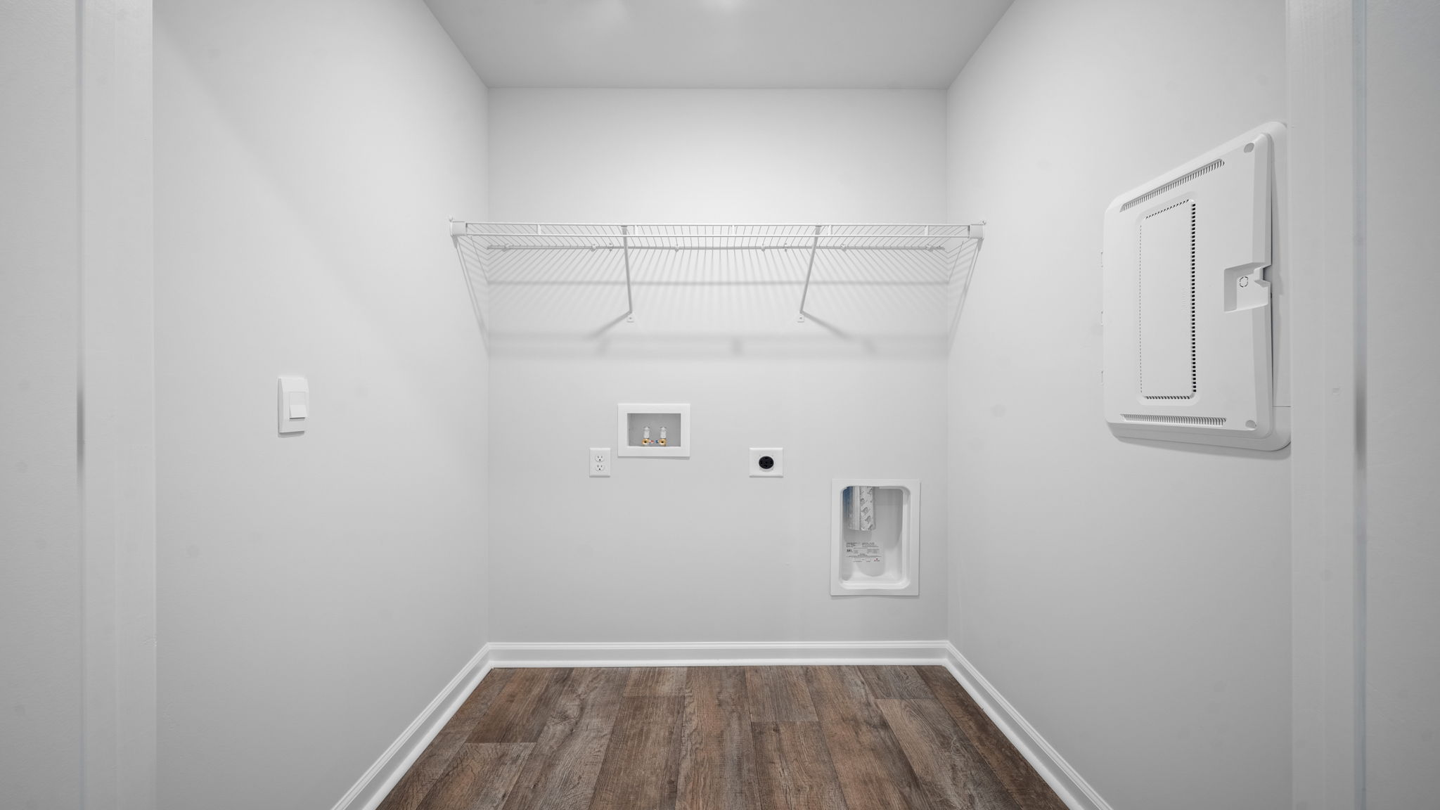 Laundry room with shelves