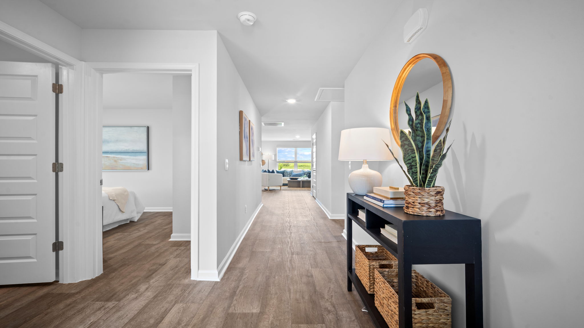 Bright foyer entrance in the Freeport floorplan featuring open-concept layout, luxury flooring, and modern new construction finishes.