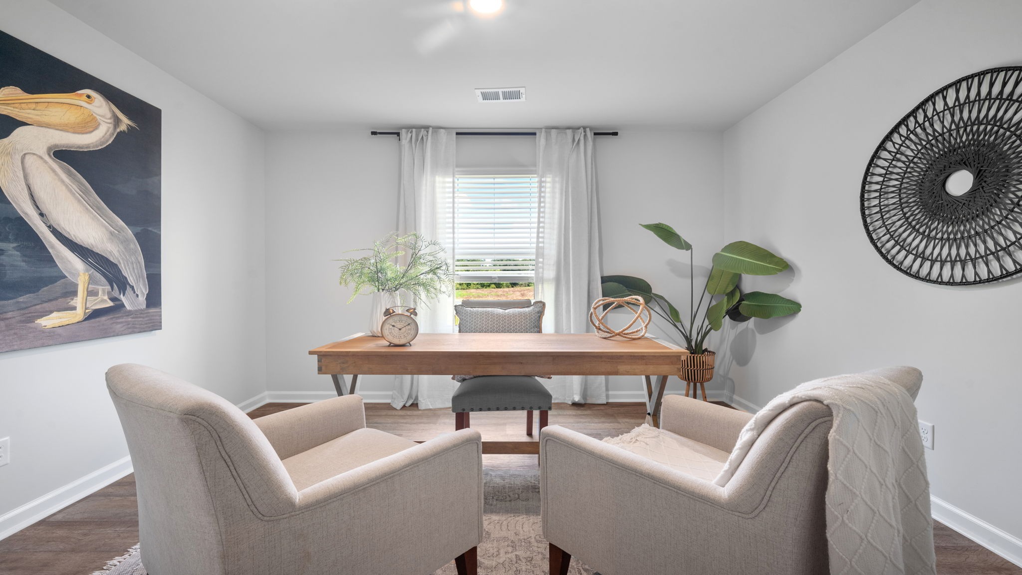 Guest bedroom decorated as an office