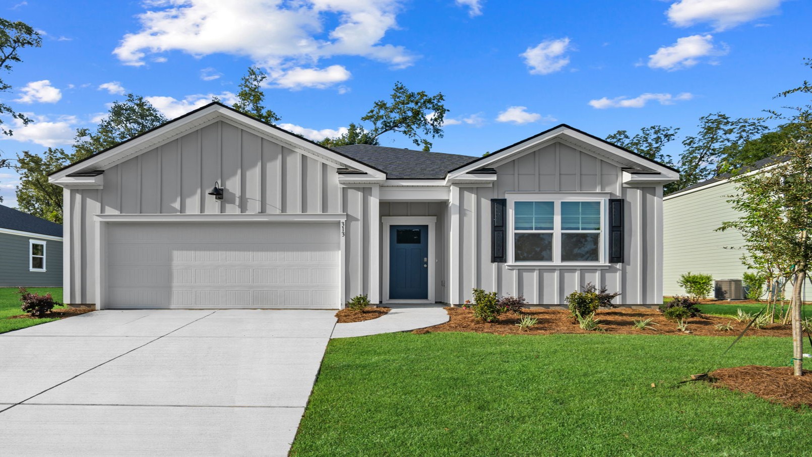 Cali floor plan exterior elevation featuring modern architecture, landscaped front yard, and two-car garage.