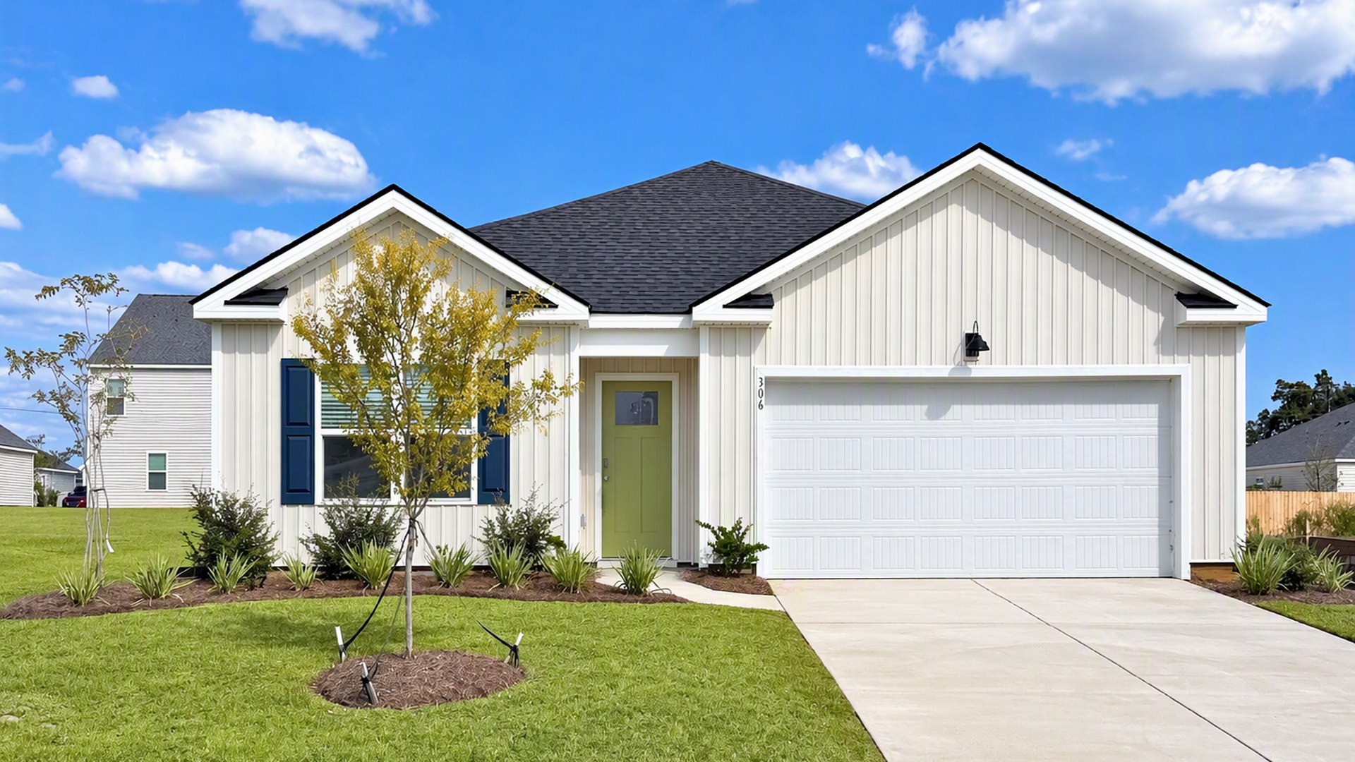 Cali floor plan exterior elevation featuring modern architecture, landscaped front yard, and two-car garage.