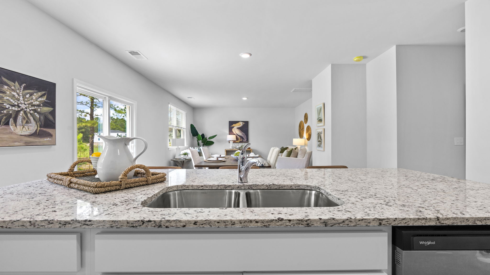 Beautiful kitchen in the Belhaven floorplan featuring premium finishes, expansive workspace, contemporary cabinetry, and open-concept design that flows seamlessly into the main living areas.