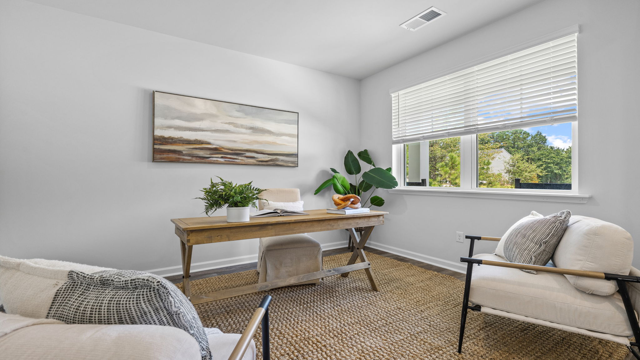 Versatile flex room in the Belhaven floorplan at Holly Oaks offering space for a home office, study area, fitness room, or hobby space to fit your lifestyle.