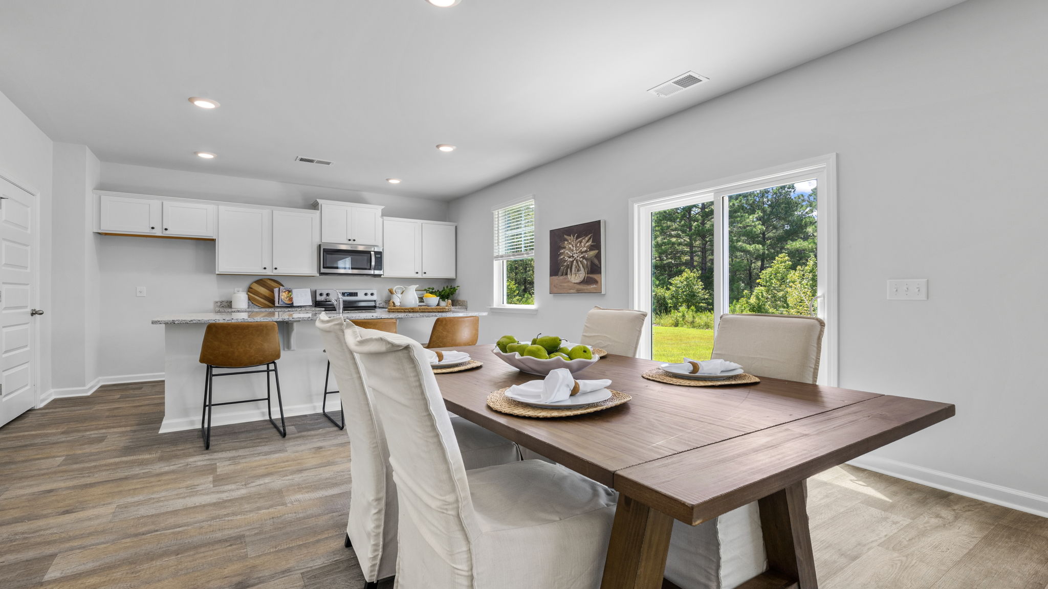 Spacious dining room in the Belhaven floorplan designed for family meals, holiday gatherings, and comfortable everyday living.