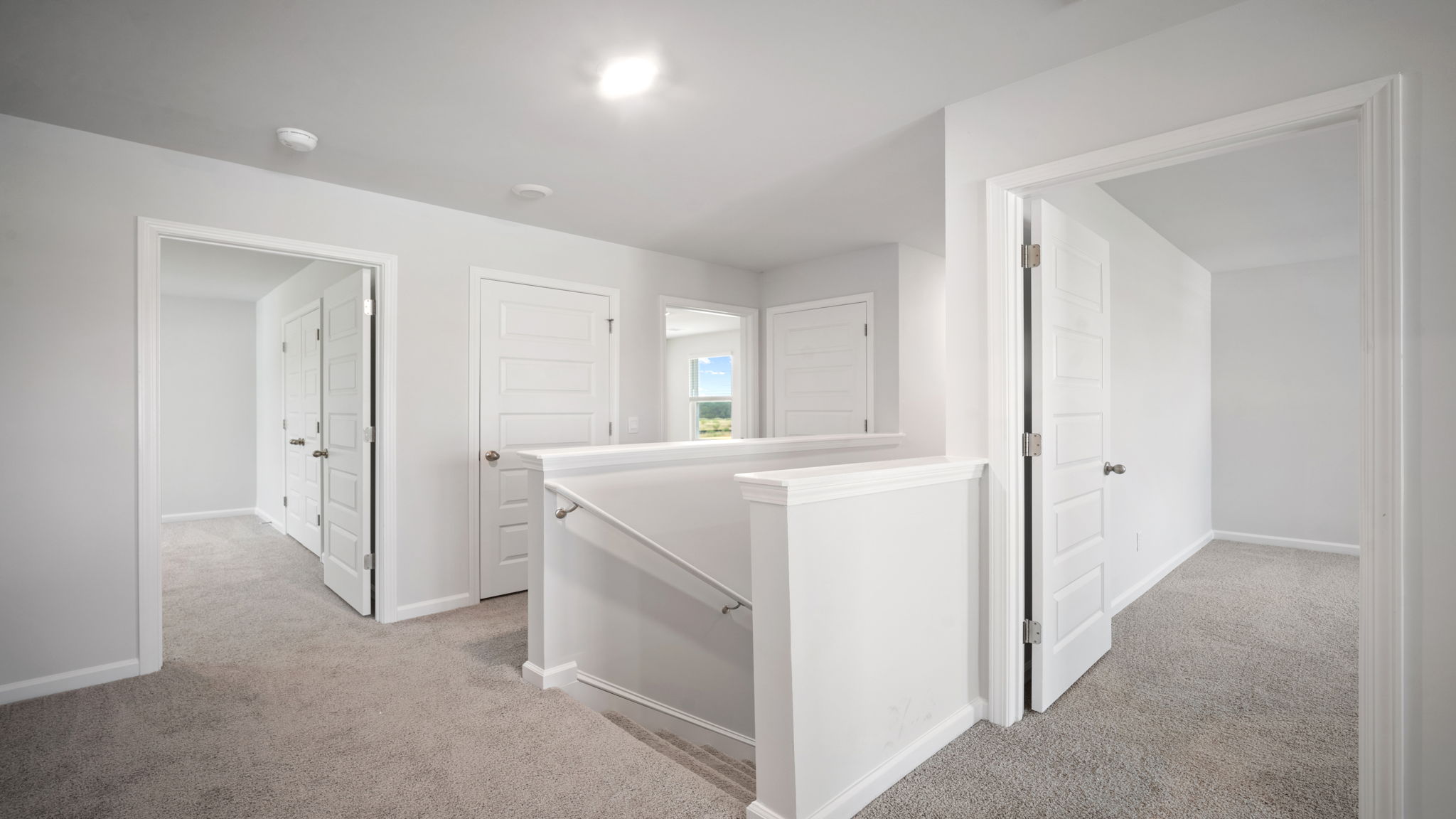 Upstairs hallway leading to different bedrooms