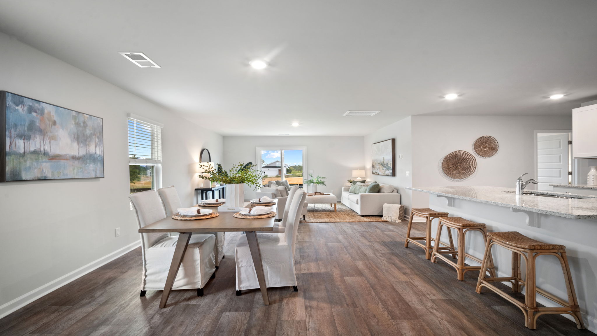 Dining area of home with a table and chairs