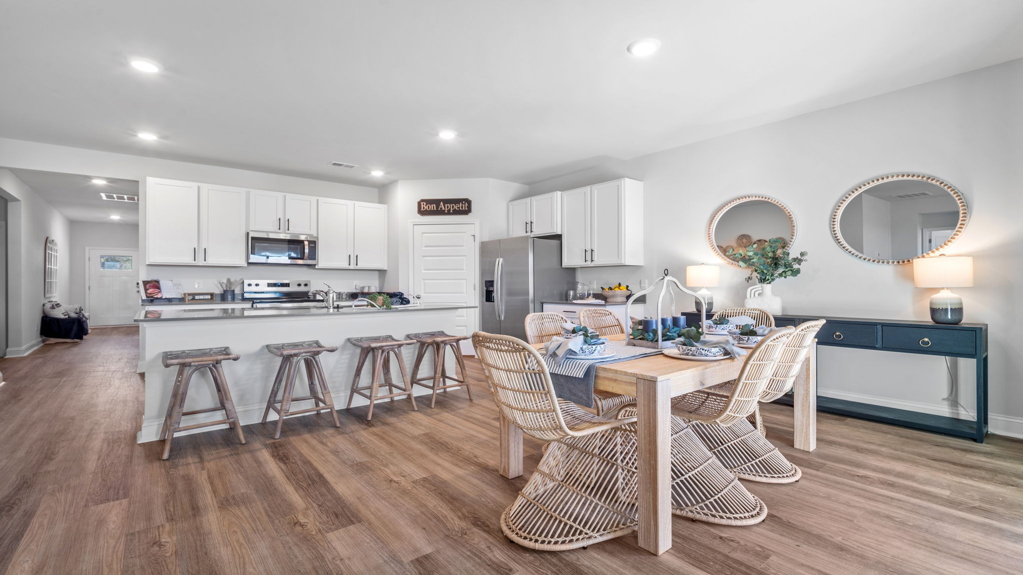 Dining area of home with view into the kitchen