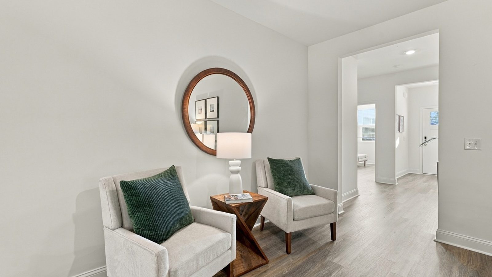 Flexible bonus seating area ideal for a reading nook, home office setup, or additional living space.