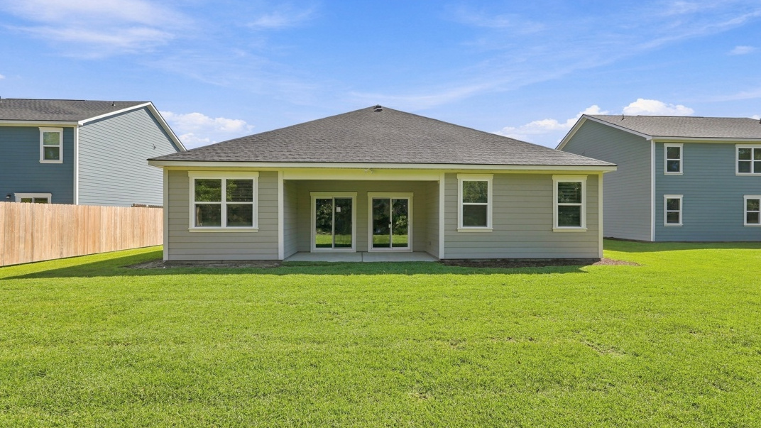 Martin F rearexterior of home in Laurel Grove community with three car garage