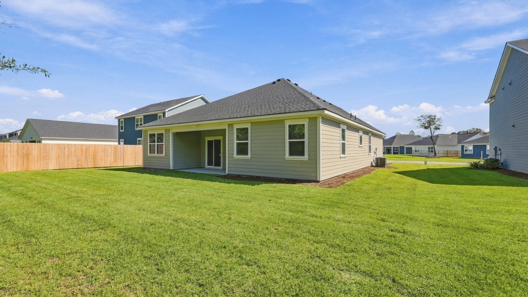 Side angle of Rear Exterior of Martin F floor plan with 3 car garage in Laurel Grove community of Guyton, GA