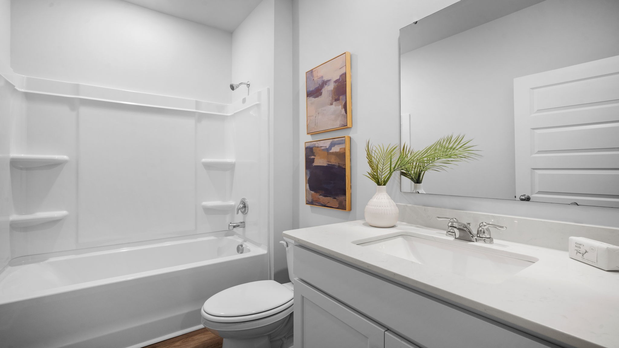 Guest bathroom featuring luxury finishes and large shower