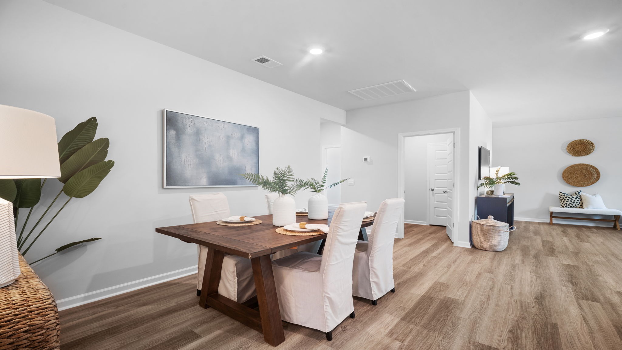 Open dining area in Lakeside floor plan seamlessly connected to kitchen and living room for easy entertaining