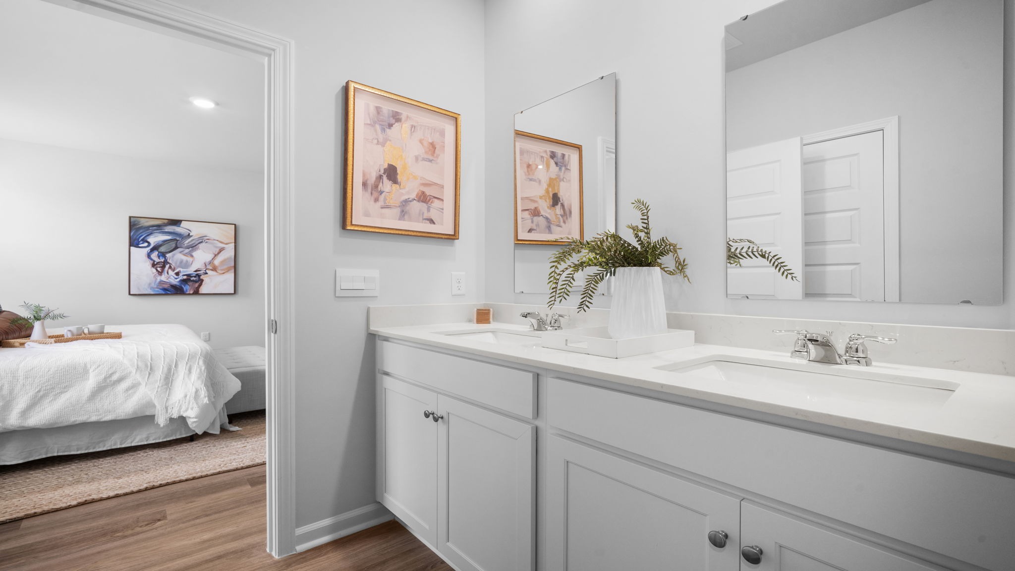 Luxury primary bathroom in Laurel Grove Lakeside home with walk-in shower and generous counter space