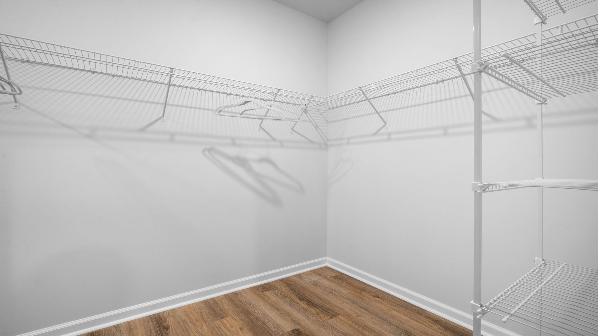 Spacious walk in closet in the primary bedroom