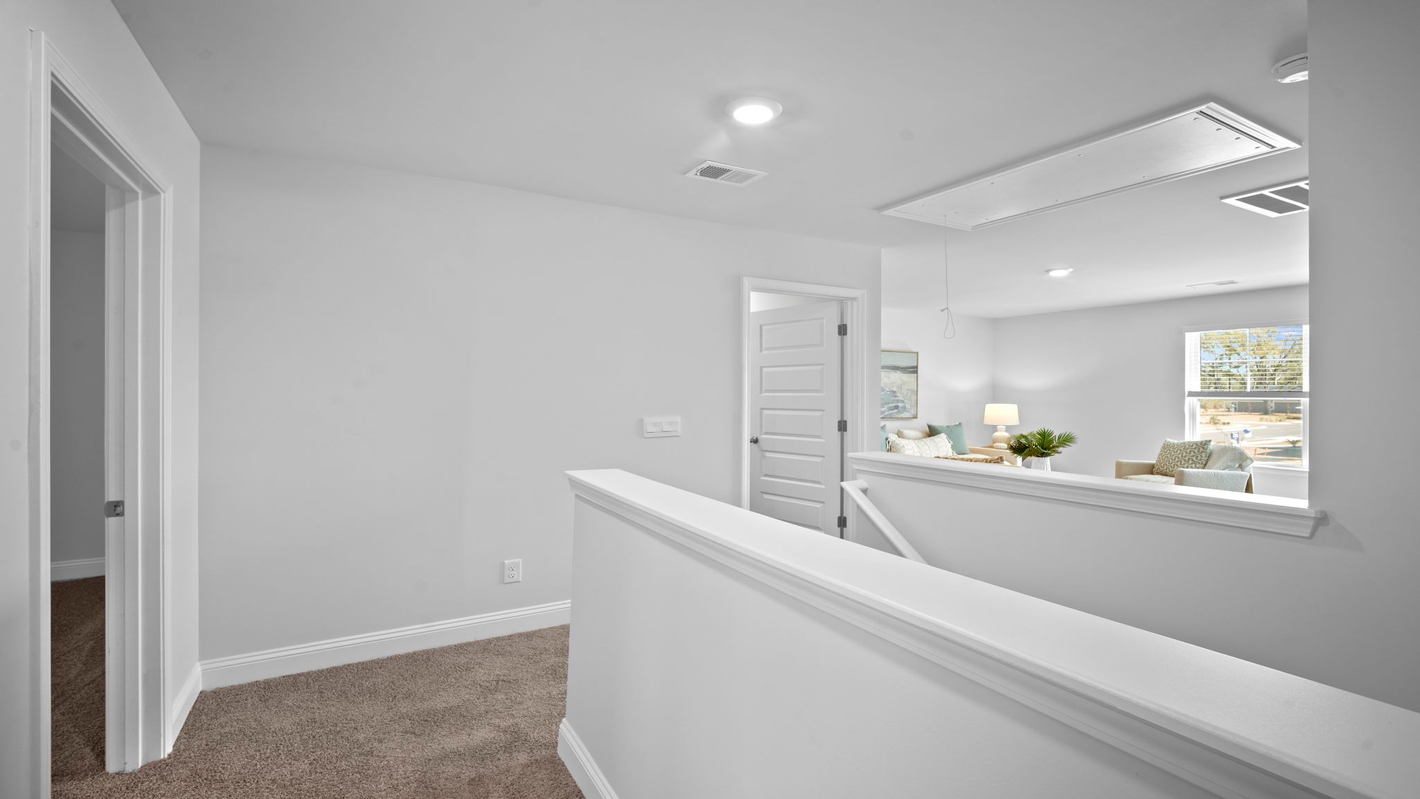 Upstairs hallway leading to different bedrooms