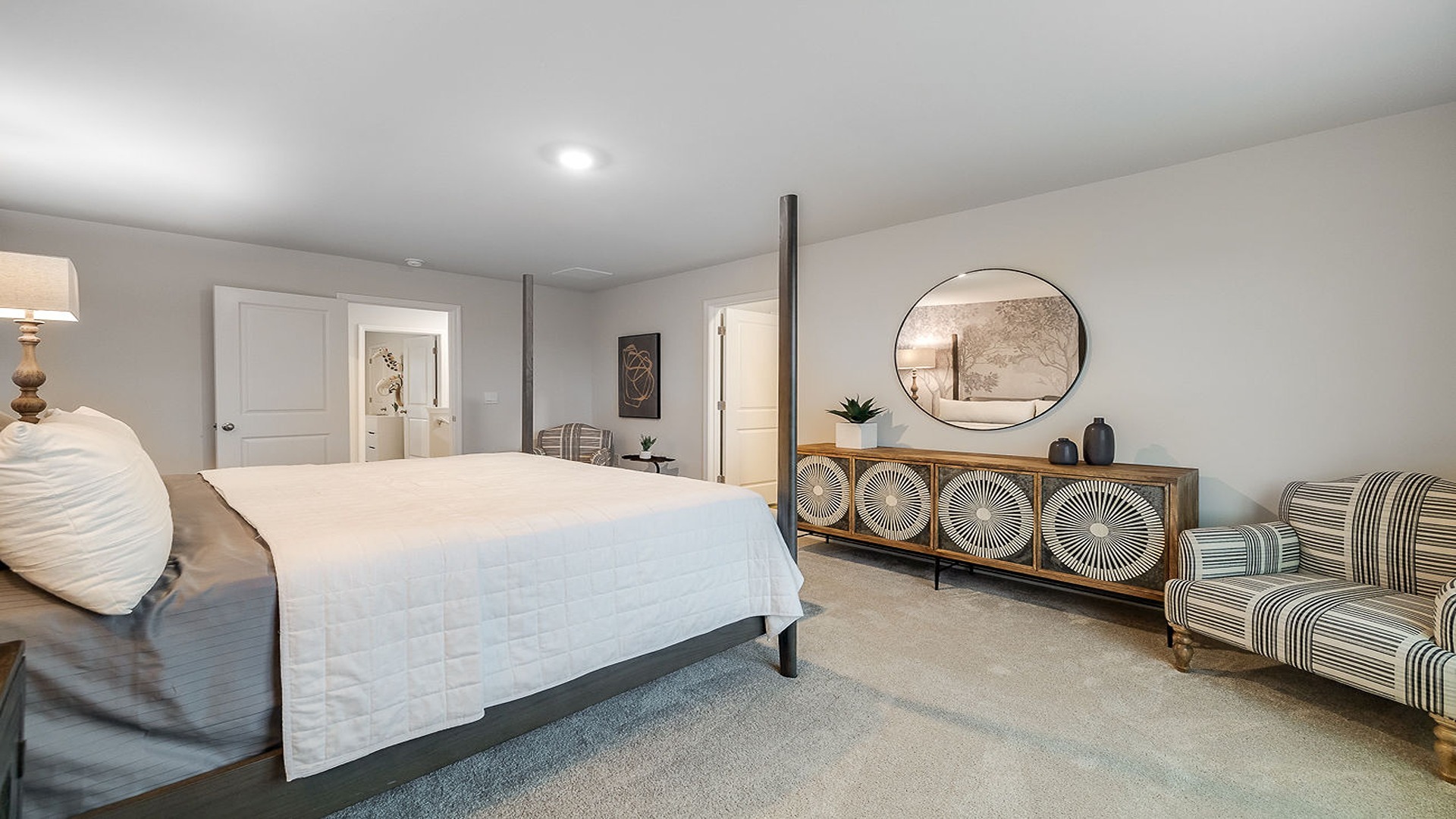 Owner’s suite in DR Horton Hayden home with ensuite bath, dual vanities, and walk-in closet designed for comfort