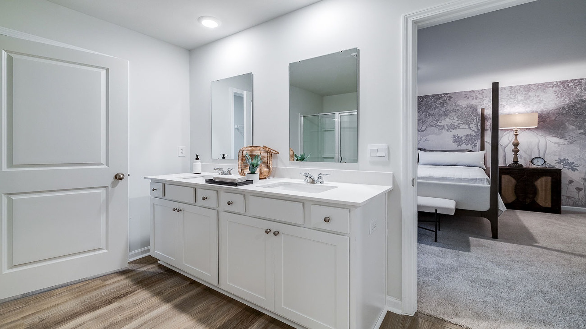 Modern bathroom in Hayden model featuring dual vanity, clean finishes, and functional layout