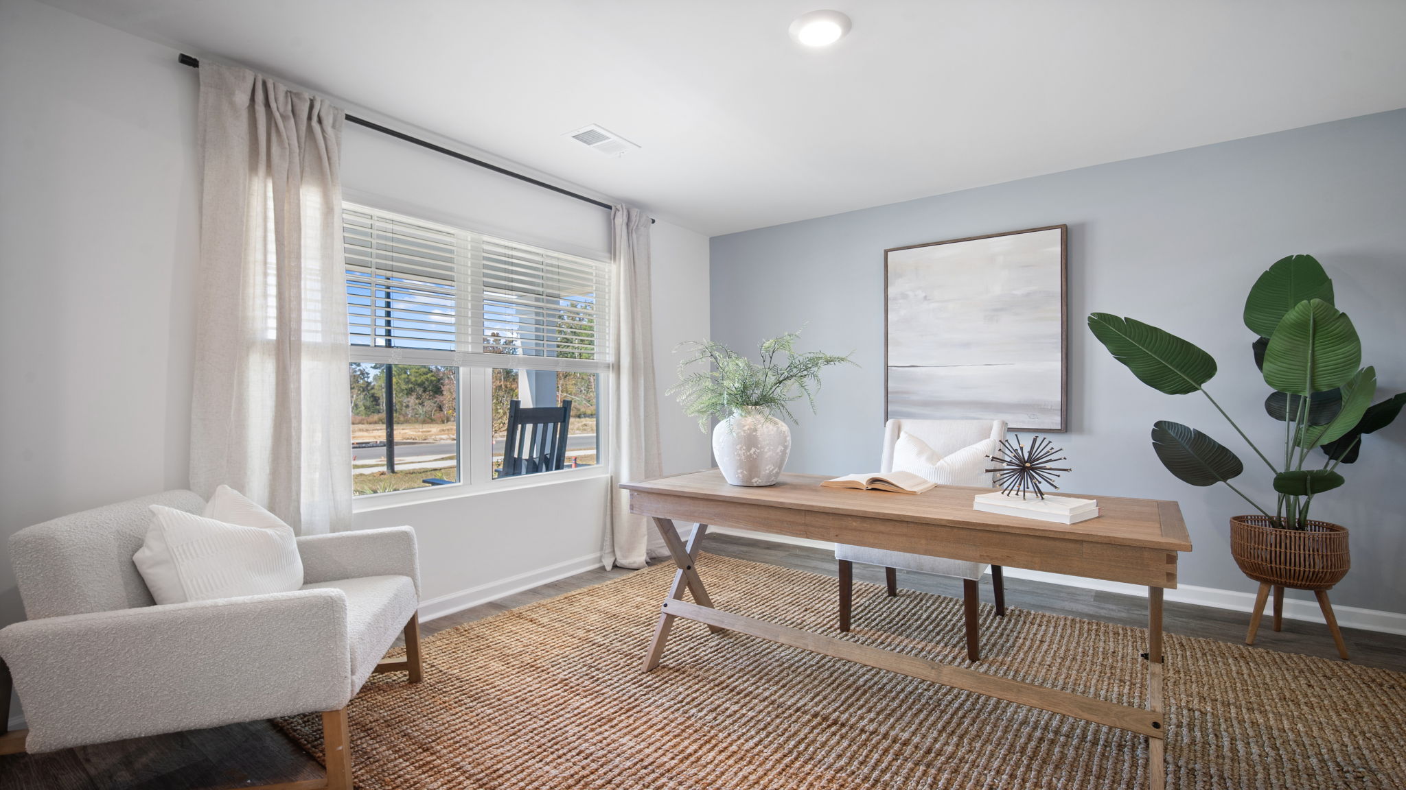 Flexible bonus room in the Hayden floor plan at Laurel Grove by D.R. Horton featuring a versatile layout ideal for a home office, study, fitness room, hobby space, or additional living area.