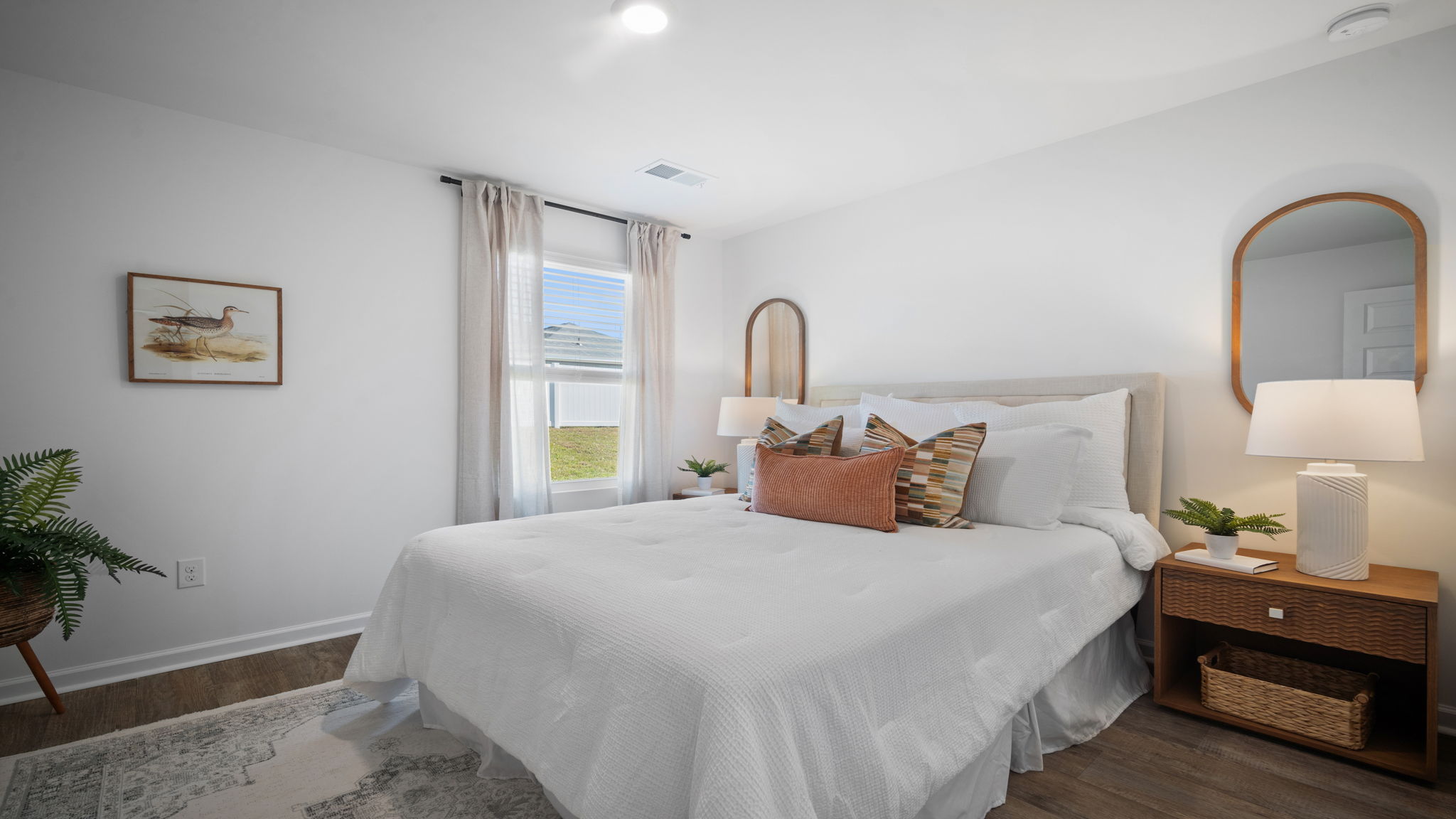 Bright secondary bedroom in the Hayden floor plan by D.R. Horton showcasing modern finishes, generous closet storage, and a versatile layout designed for comfort