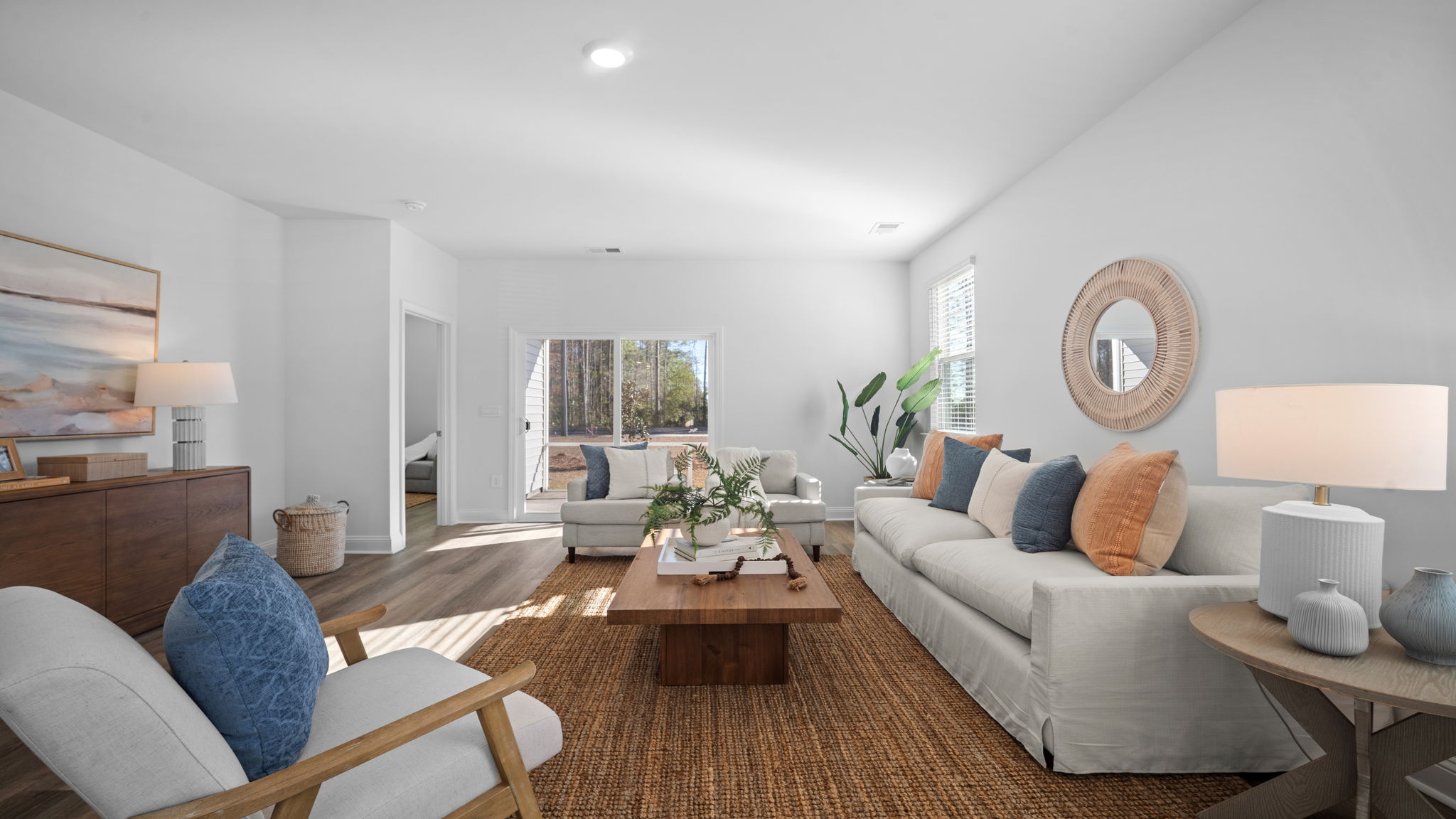 Living area of home decorated with seating