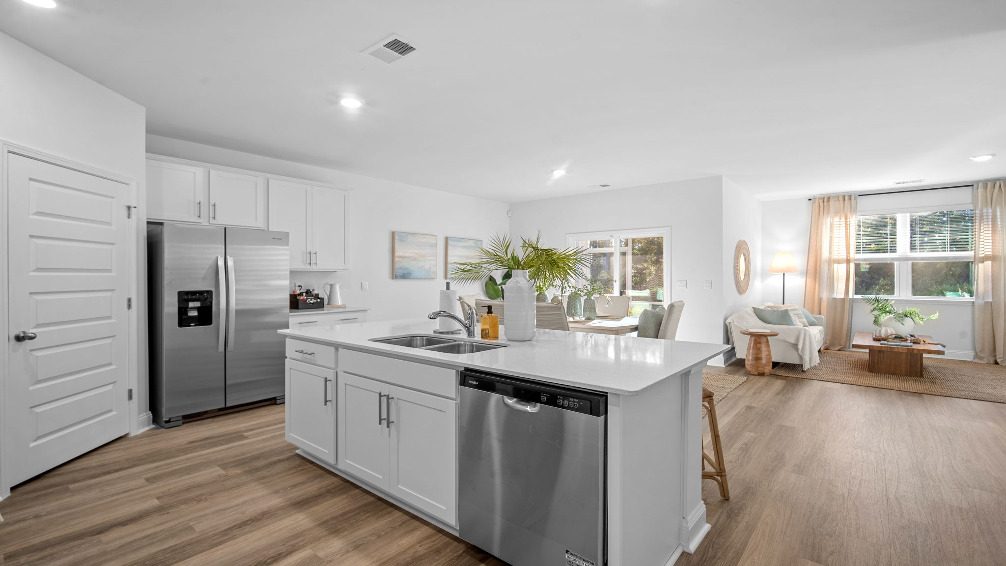 Kitchen island with a stainless dishwasher