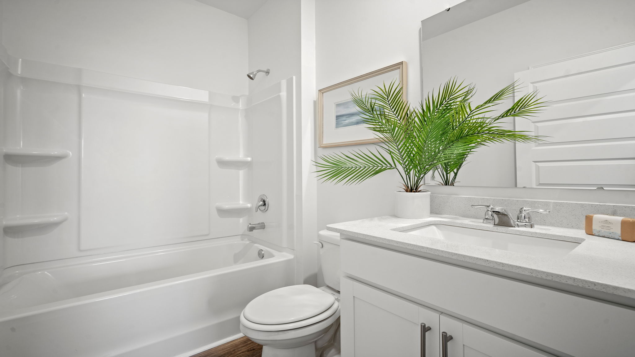 Guest bathroom with a tub shower