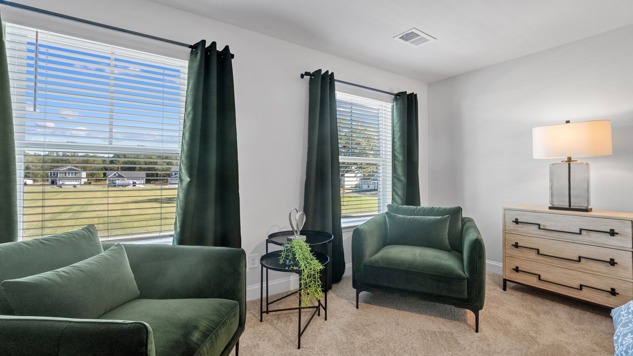 View of the living room with a large window
