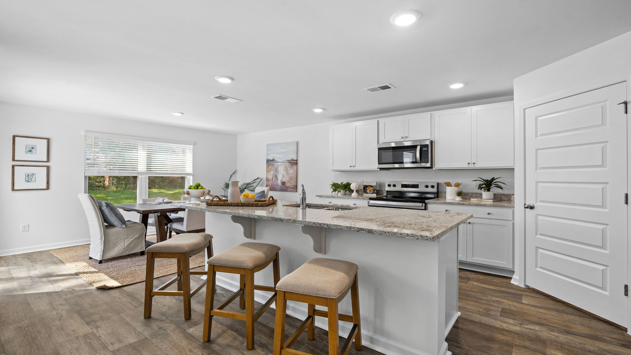 Open kitchen overlooking the dining and living areas.