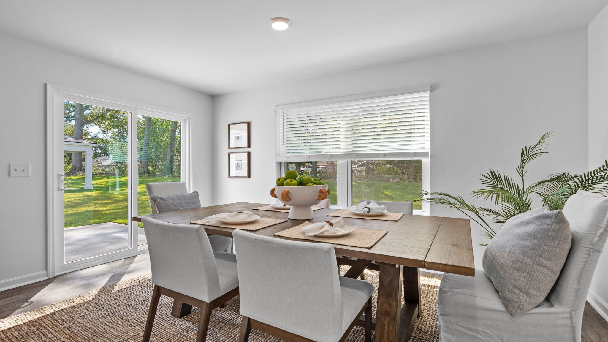Dining area adjacent to the kitchen featuring large windows and open-concept entertaining space.