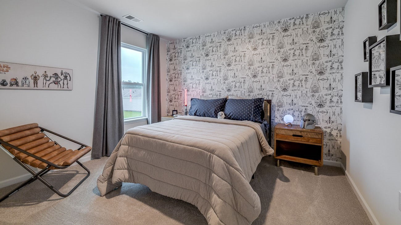 Secondary bedroom in Hayden floor plan ideal for guests, children, or home office in DR Horton Stockyard