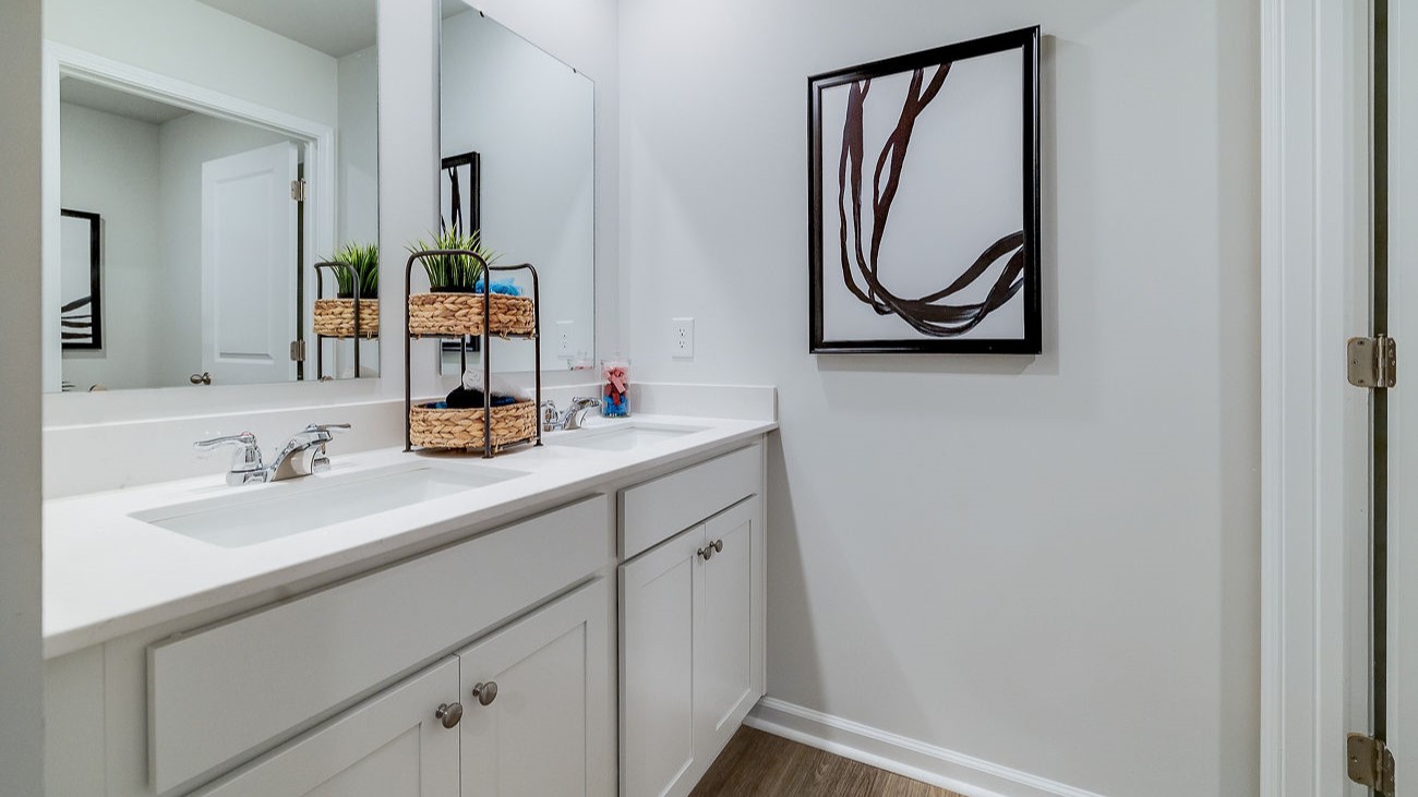 Full bathroom on main level in Hayden home providing convenience for guests and flexible living arrangements.”