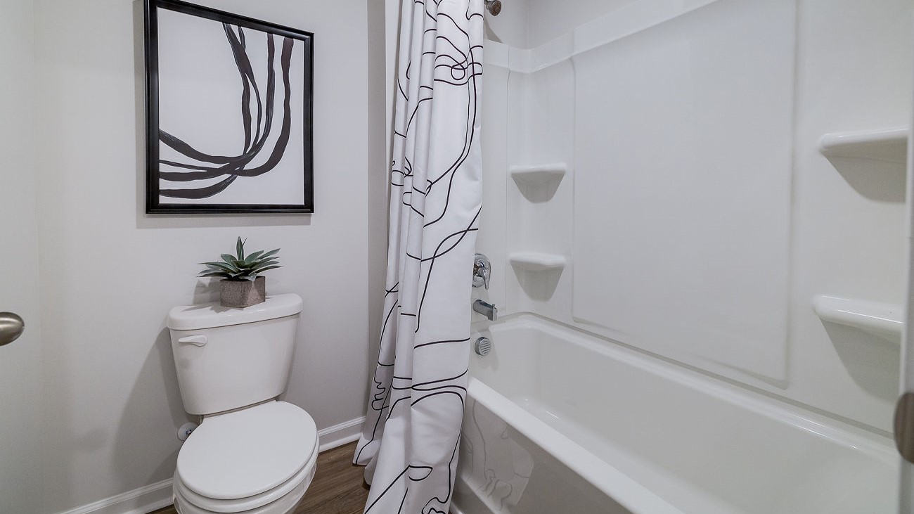 Full bathroom on main level in Hayden home providing convenience for guests and flexible living arrangements.”