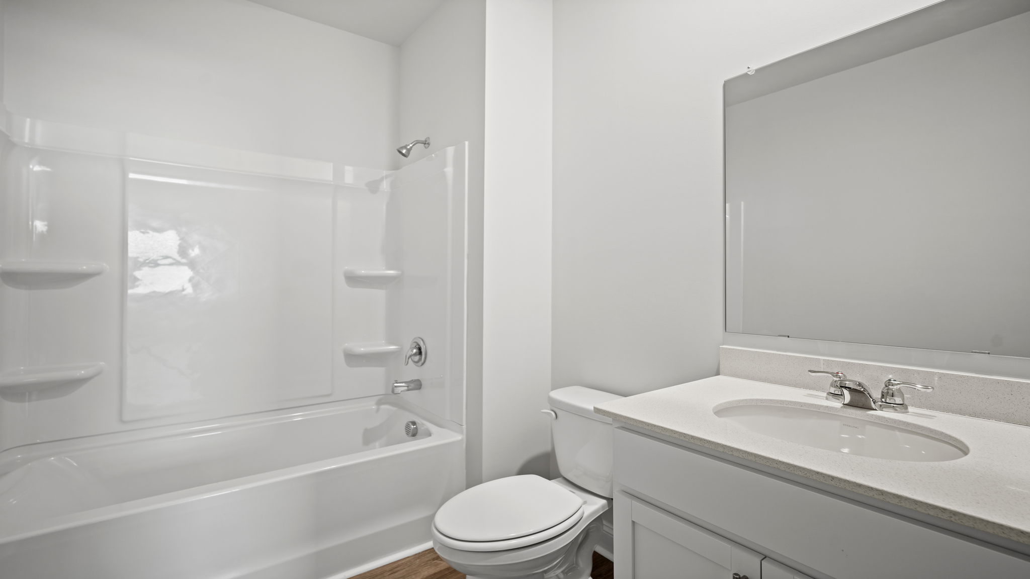 Full guest bathroom featuring contemporary fixtures and convenient access to secondary bedrooms.