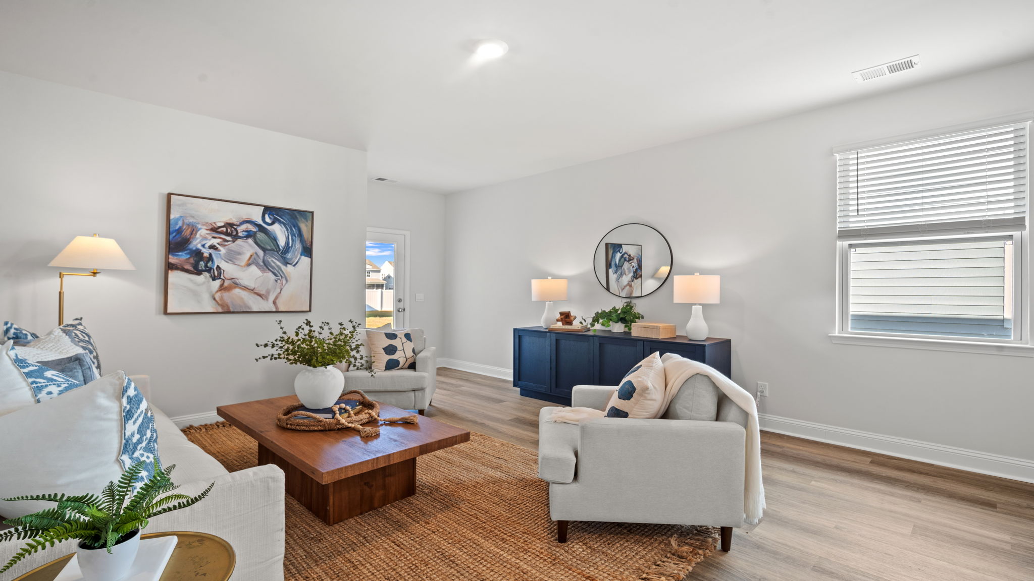 Spacious great room connecting effortlessly with kitchen and dining areas.