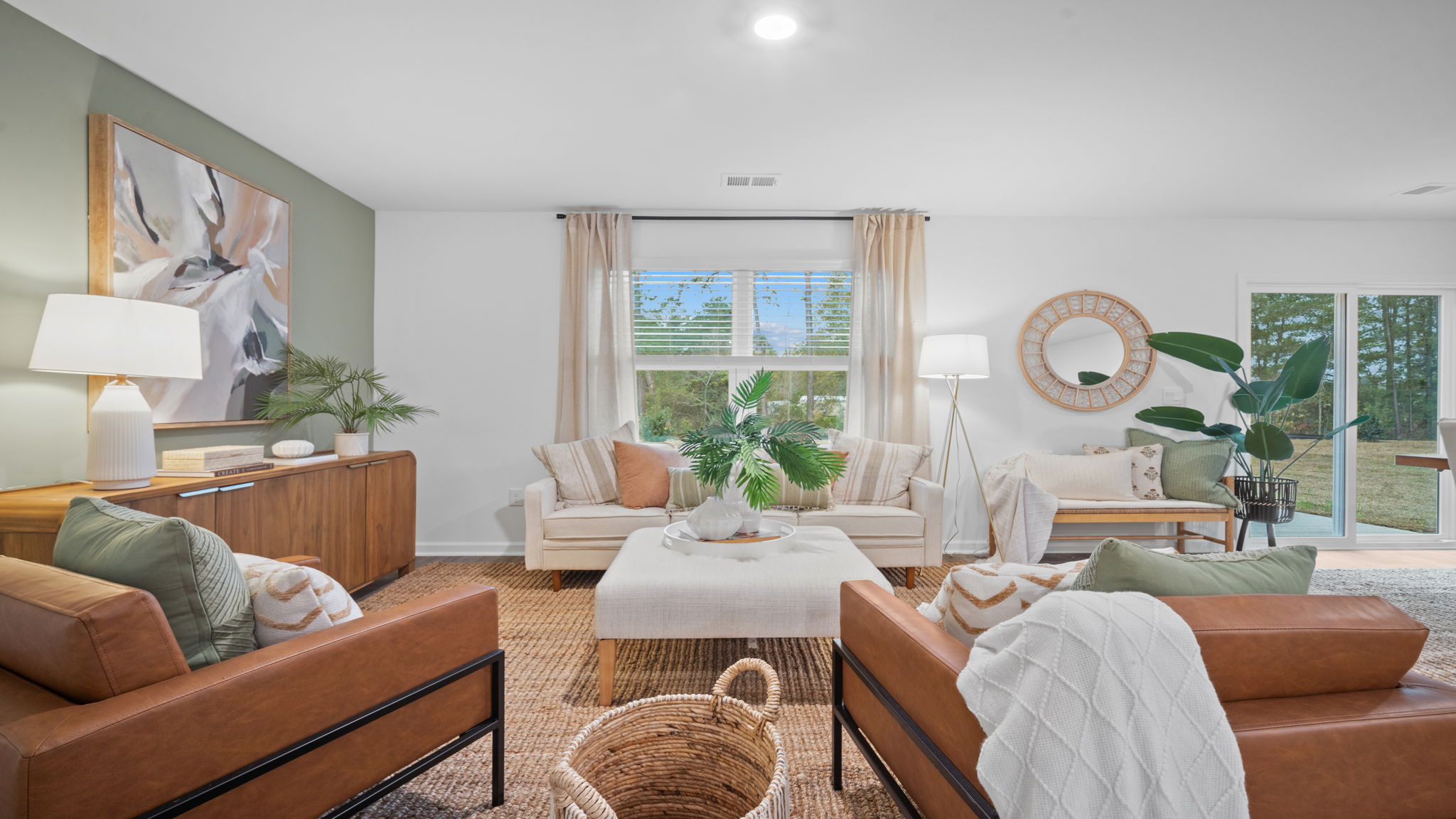 Living room decorated with seating and tables
