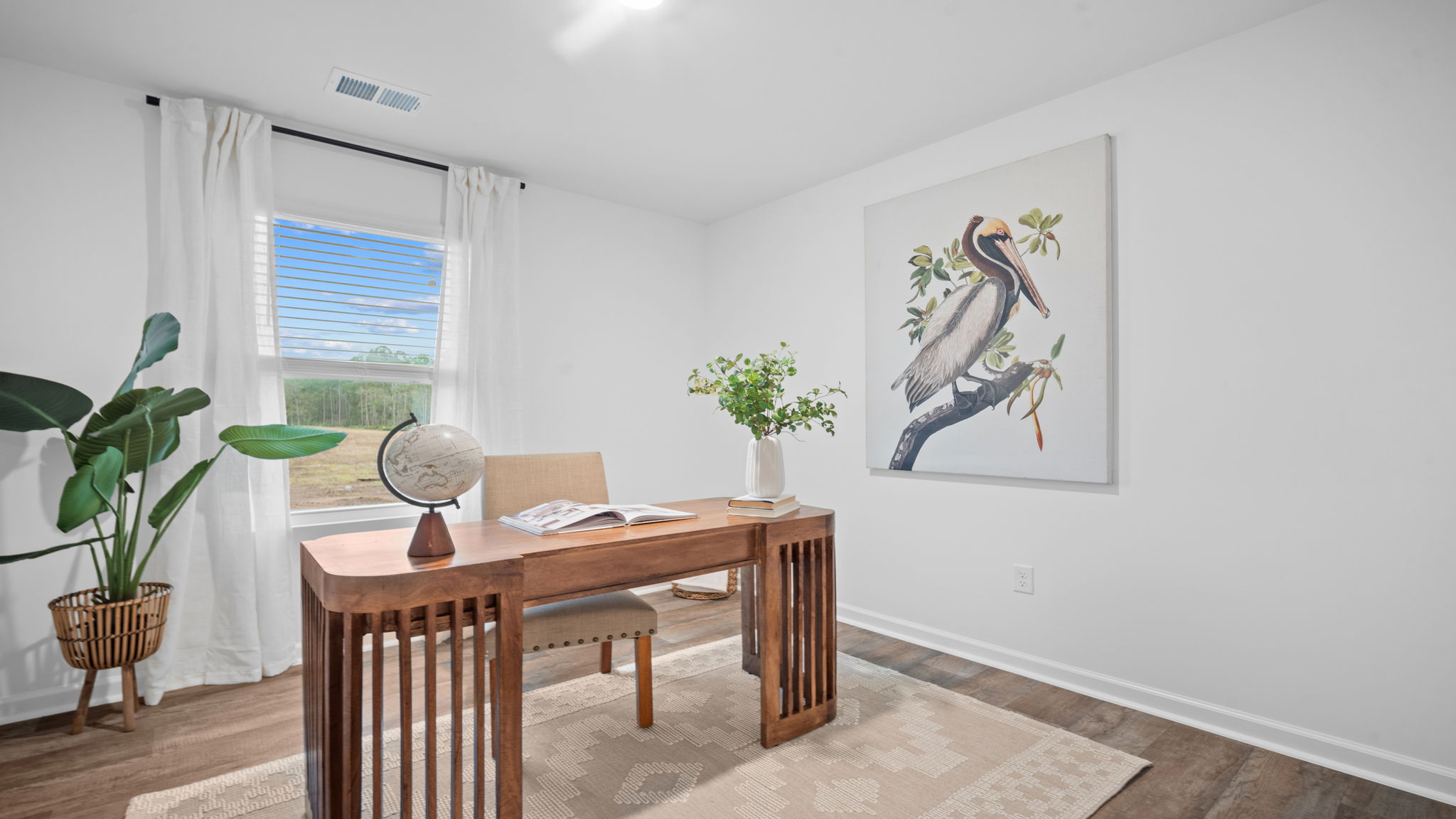 Guest bedroom decorated as an office