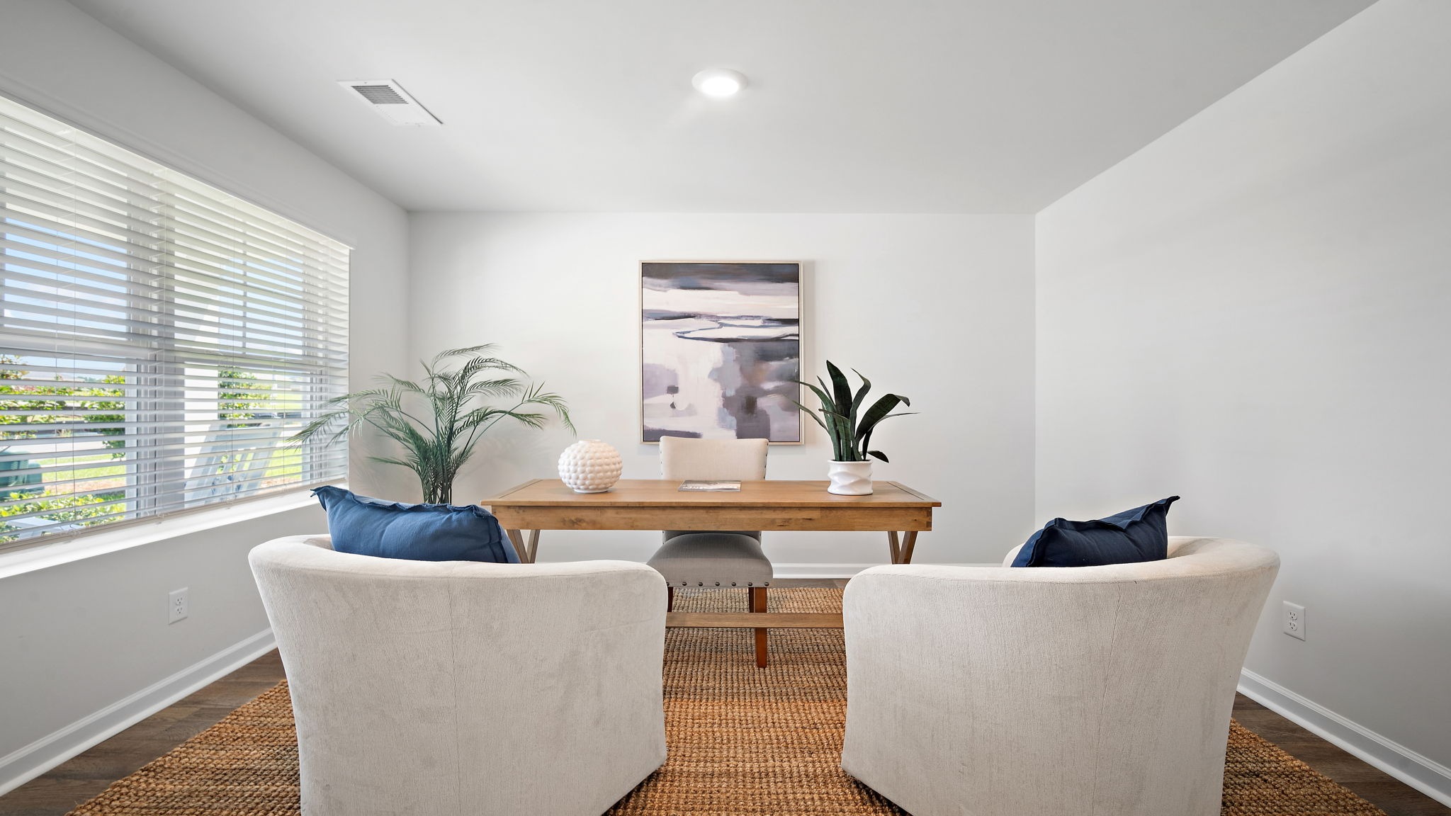 Flexible area perfect for a media room, playroom, home office, or additional living space.
