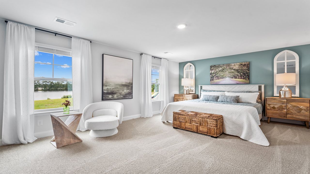 Luxurious primary suite offering privacy, comfort, and a relaxing retreat atmosphere.