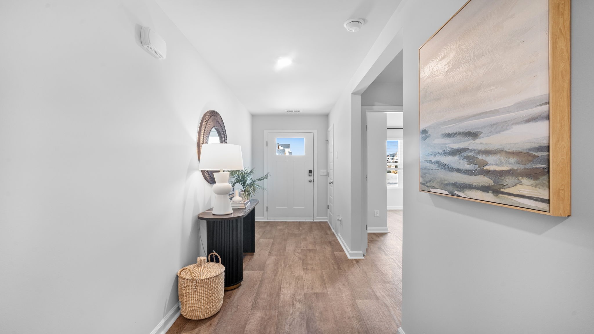 Welcoming foyer in the Cali floor plan featuring a bright entryway, modern finishes, and an inviting first impression.