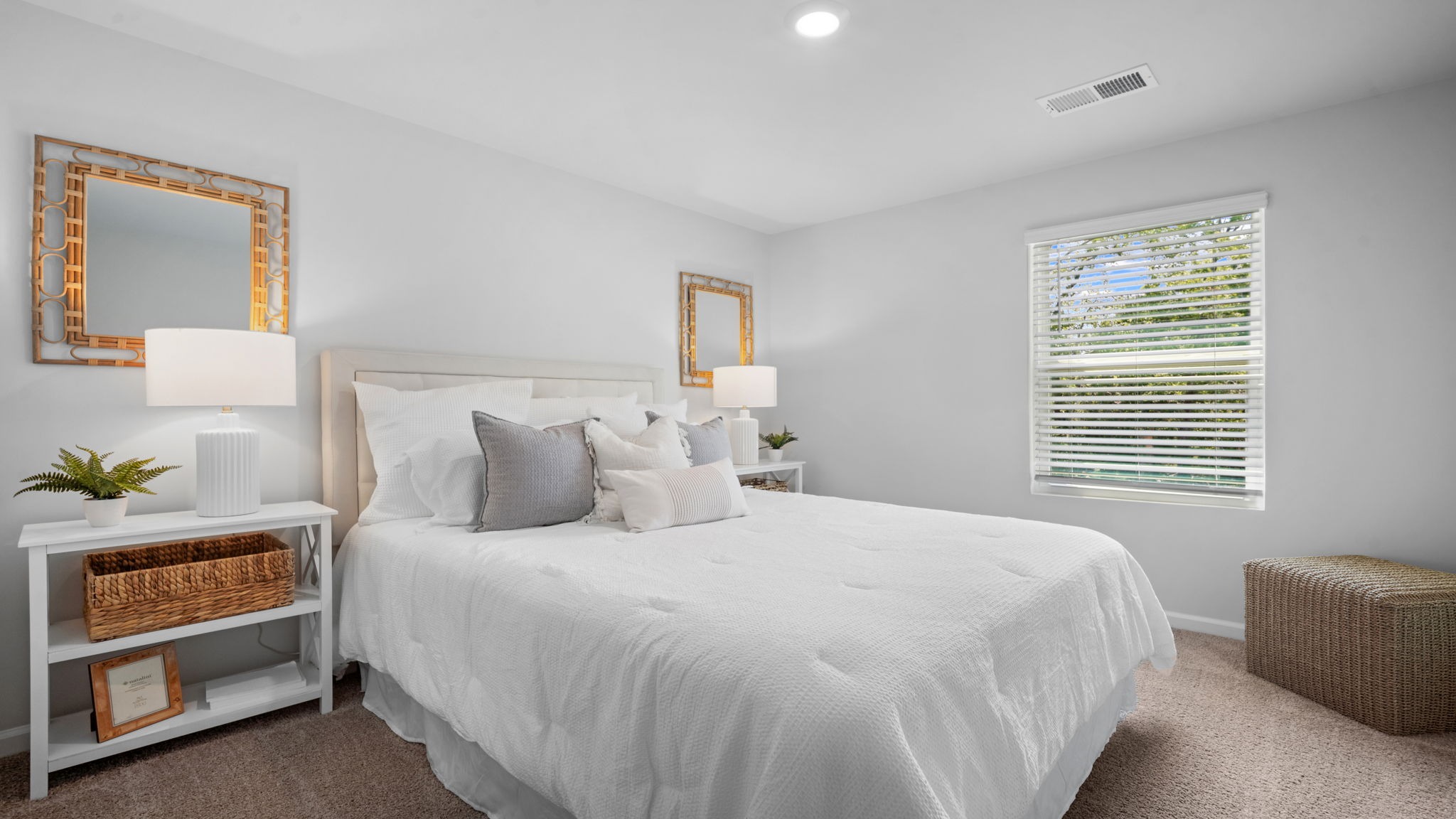 Secondary bedroom in the Belhaven home ideal for guests, family members, or a home office setup.