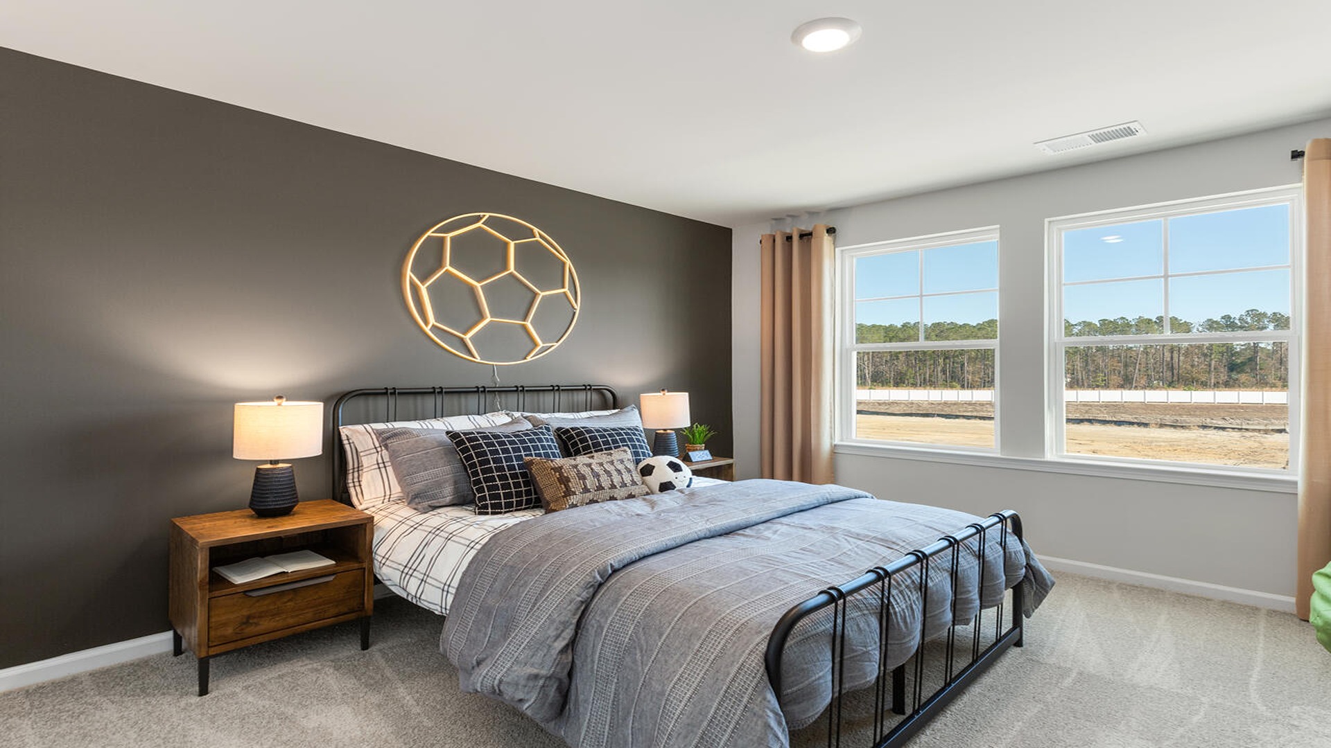 Guest bedroom with a bed and side table
