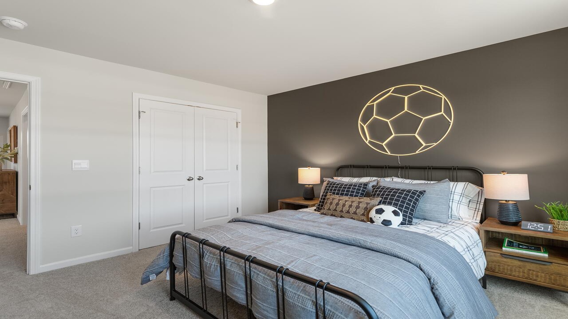 Guest bedroom with a bed and side table