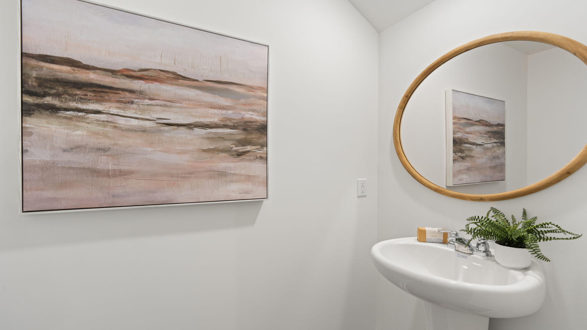 Convenient powder room on the main level of the Denmark floor plan