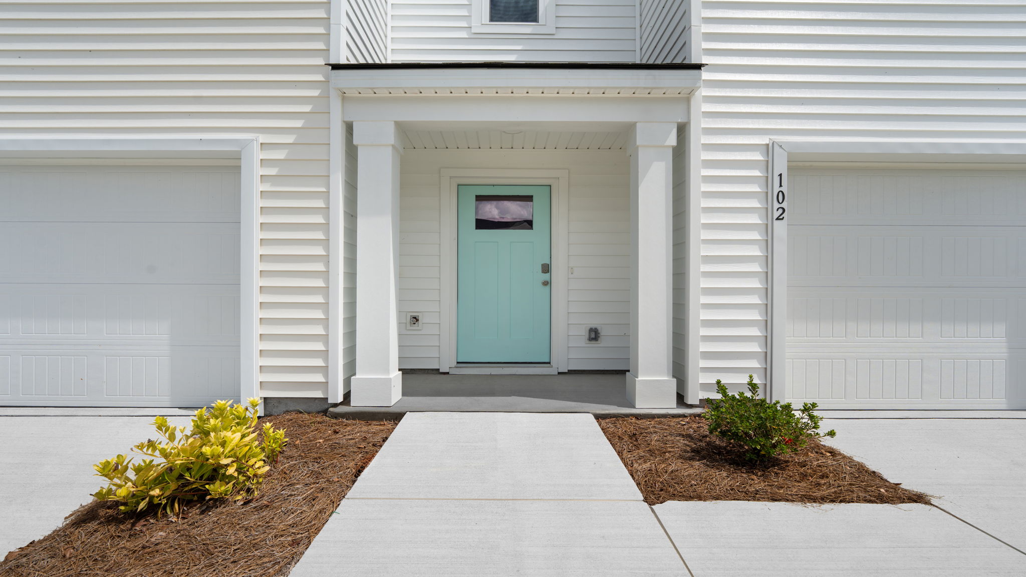 Covered front entry of the Denmark floor plan