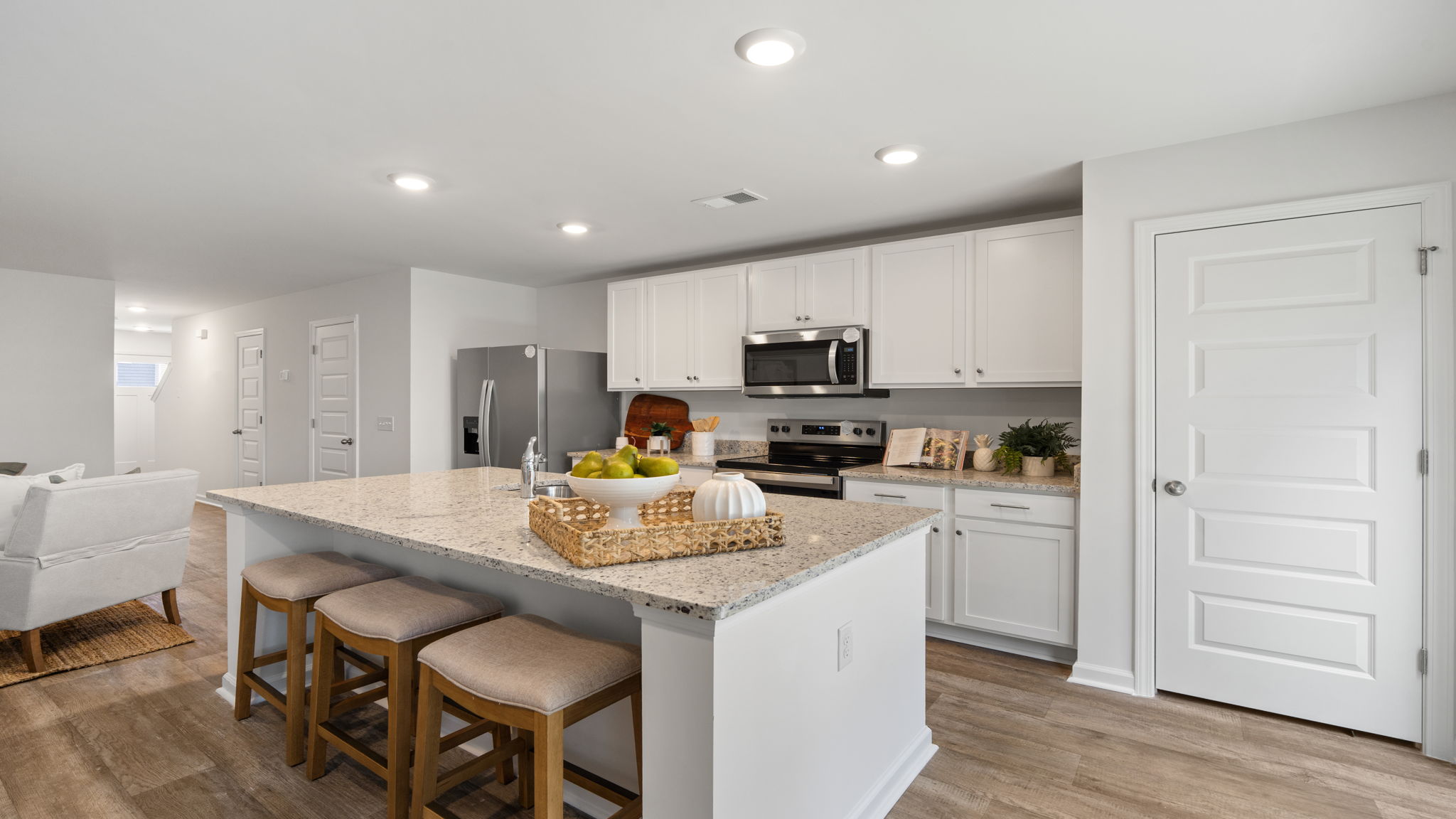 Modern kitchen with oversized island in the Denmark floor plan